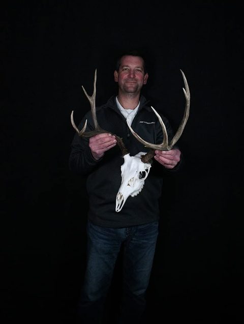 Customer with their finished mount from Jason's Taxidermy