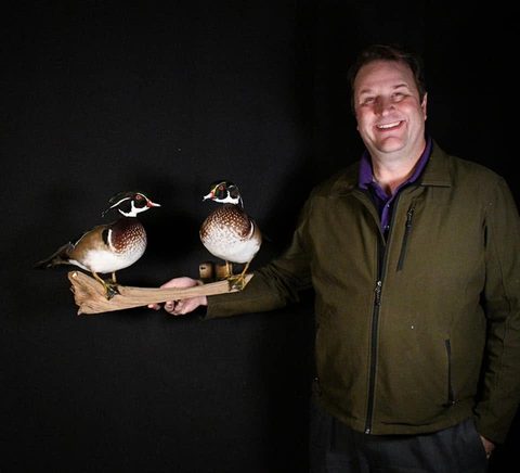 Customer with their finished mount from Jason's Taxidermy
