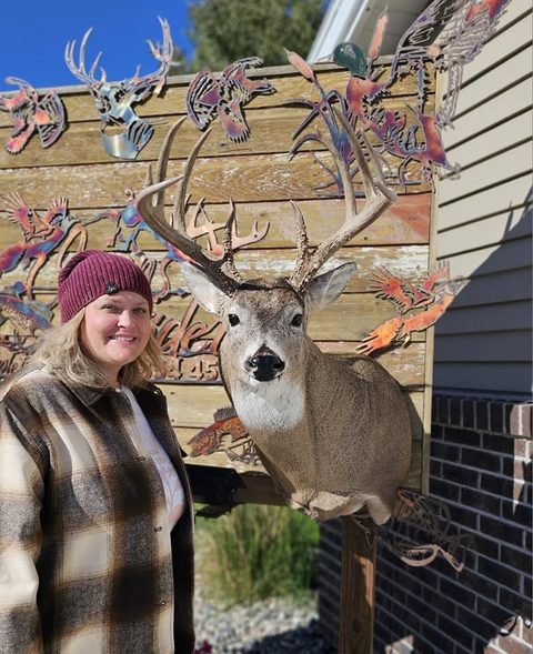 Customer with their finished mount from Jason's Taxidermy