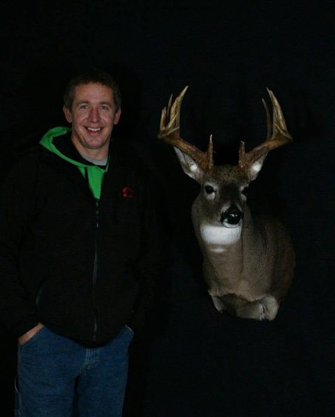 Customer with their finished mount from Jason's Taxidermy