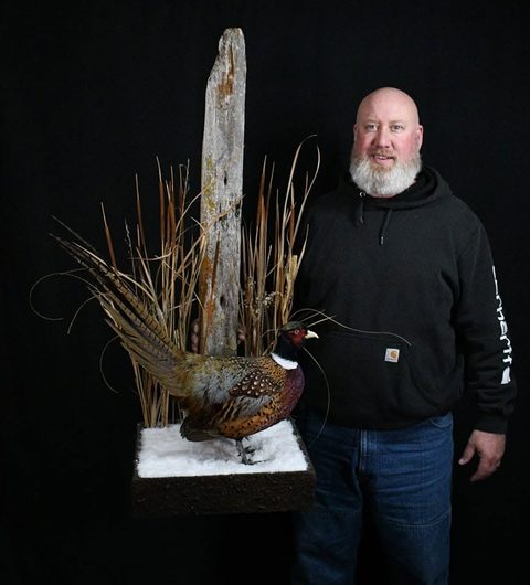 Customer with their finished mount from Jason's Taxidermy