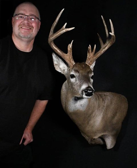 Customer with their finished mount from Jason's Taxidermy