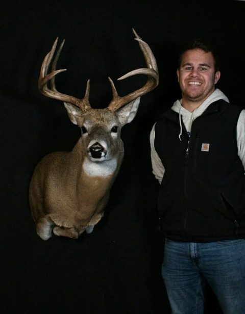 Customer with their finished mount from Jason's Taxidermy