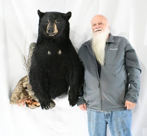 Customer with their finished mount from Jason's Taxidermy