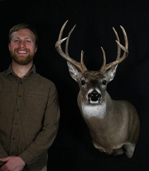 Customer with their finished mount from Jason's Taxidermy