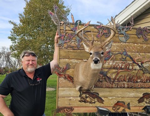 Customer with their finished mount from Jason's Taxidermy