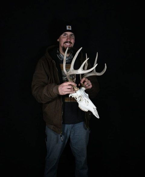 Customer with their finished mount from Jason's Taxidermy