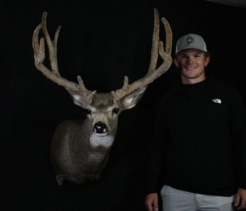 Customer with their finished mount from Jason's Taxidermy