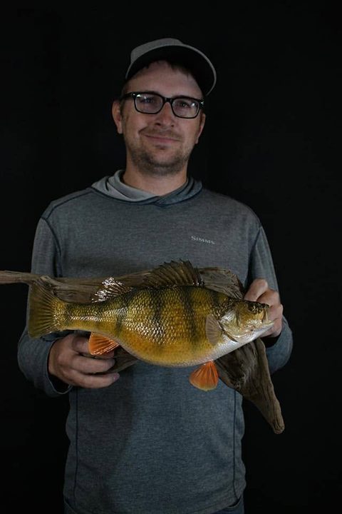 Customer with their finished mount from Jason's Taxidermy