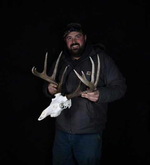 Customer with their finished mount from Jason's Taxidermy