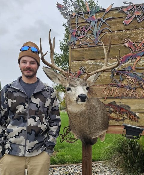 Customer with their finished mount from Jason's Taxidermy