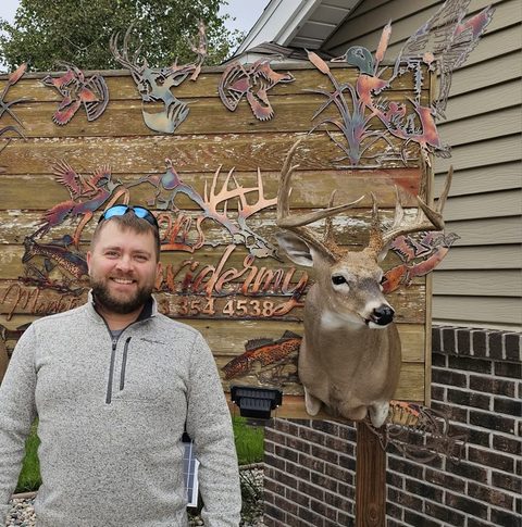 Customer with their finished mount from Jason's Taxidermy