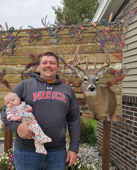 Customer with their finished mount from Jason's Taxidermy