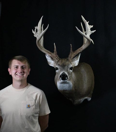 Customer with their finished mount from Jason's Taxidermy