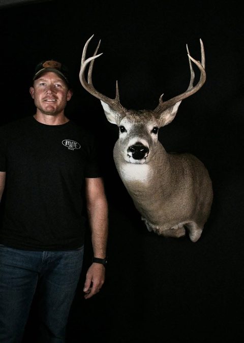 Customer with their finished mount from Jason's Taxidermy