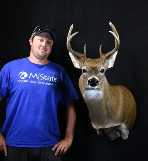 Customer with their finished mount from Jason's Taxidermy