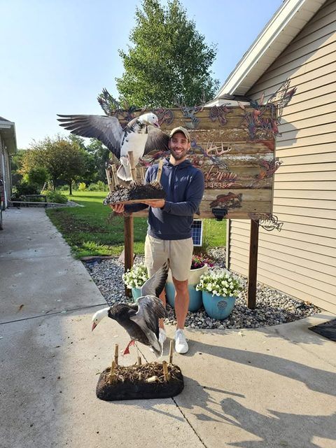 Customer with their finished mount from Jason's Taxidermy