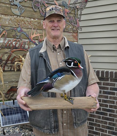 Customer with their finished mount from Jason's Taxidermy