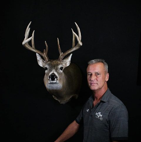 Customer with their finished mount from Jason's Taxidermy