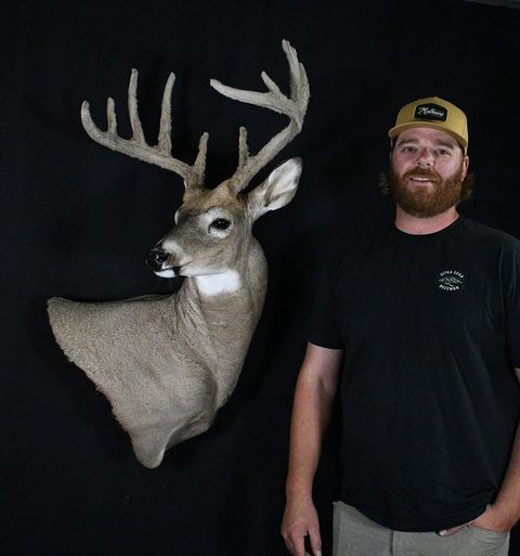 Customer with their finished mount from Jason's Taxidermy