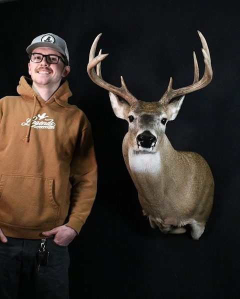 Customer with their finished mount from Jason's Taxidermy