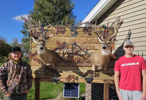 Customer with their finished mount from Jason's Taxidermy