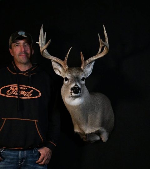 Customer with their finished mount from Jason's Taxidermy