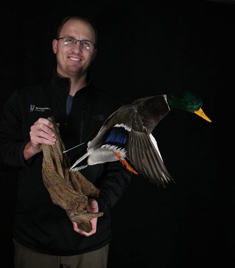Customer with their finished mount from Jason's Taxidermy